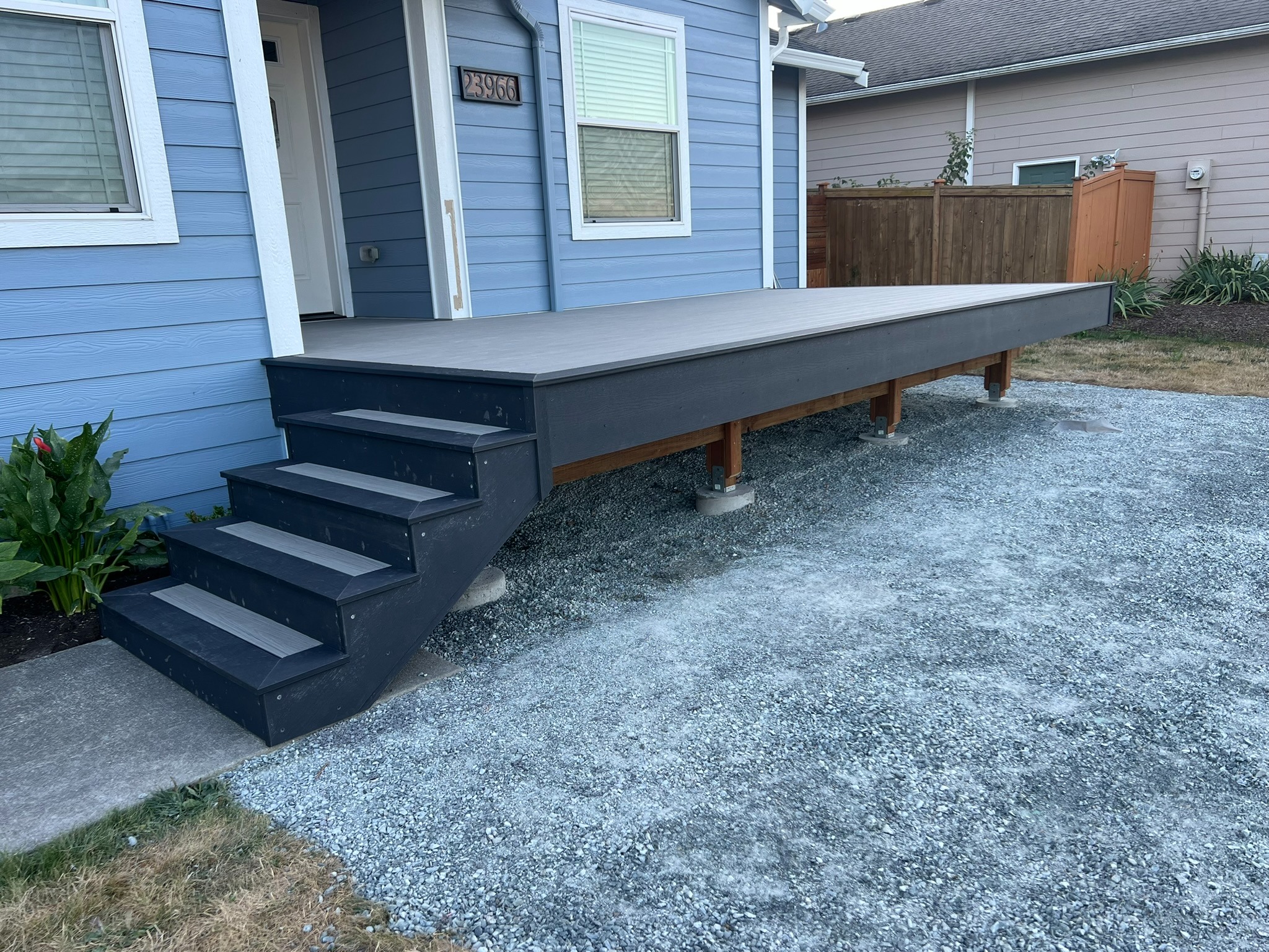 Finished gray decking and stairs before the cable railing was installed