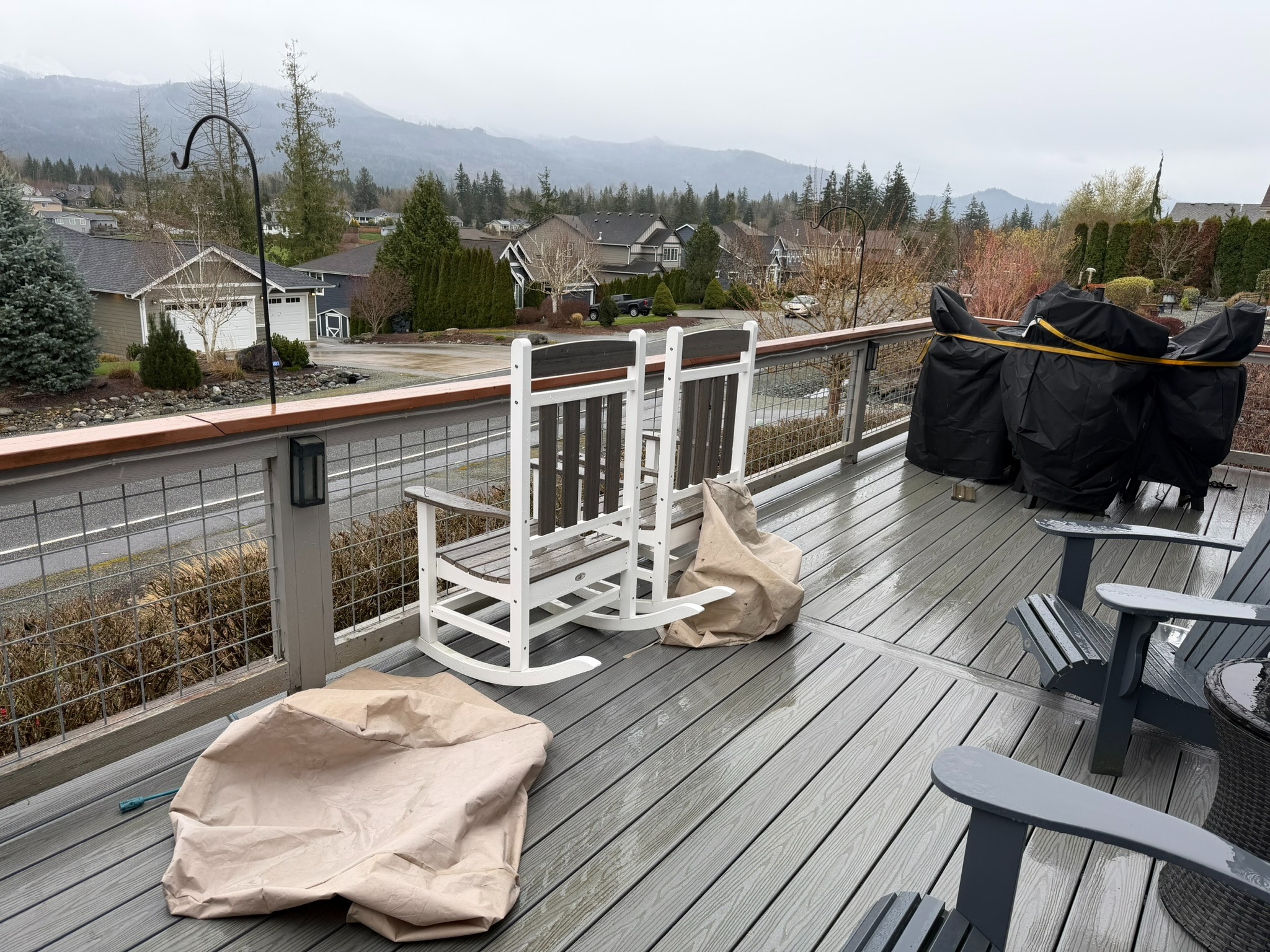 Finished deck seating area overlooking the neighborhood
