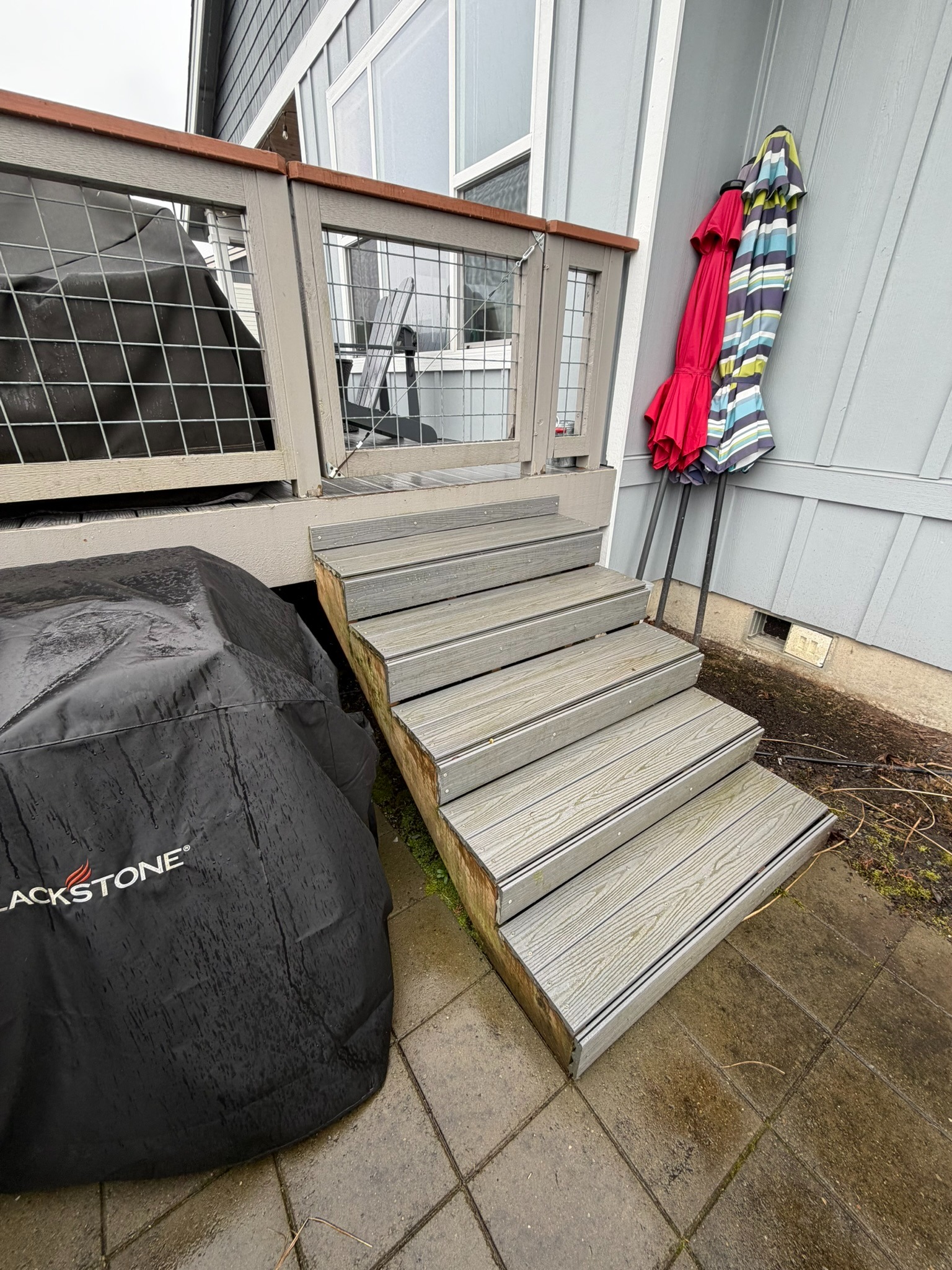 Finished composite stairs with cable railing